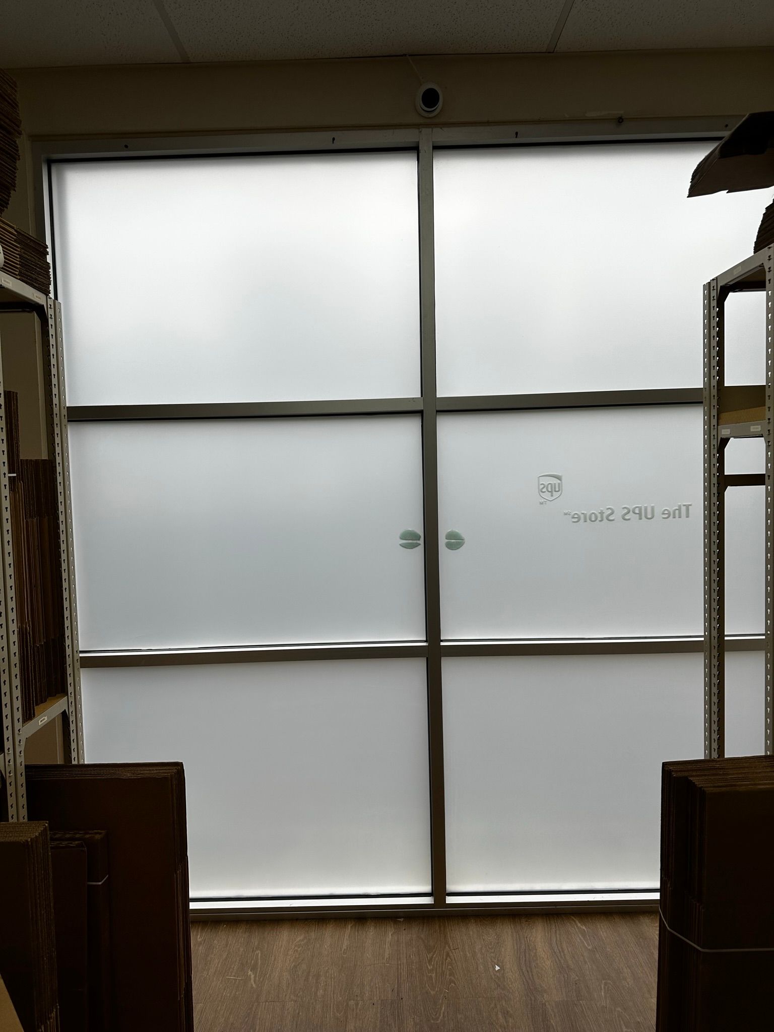 Frosted flat-glass window tint installation